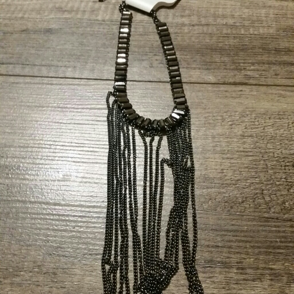 Charming Charlie necklace with chains.